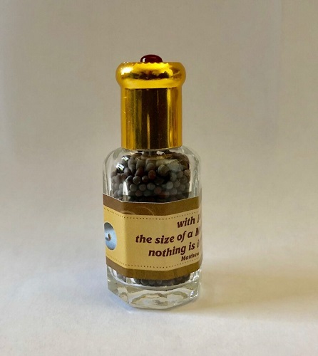a vial of mustard seeds