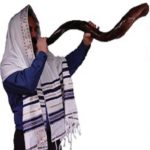 a man blowing a shofar